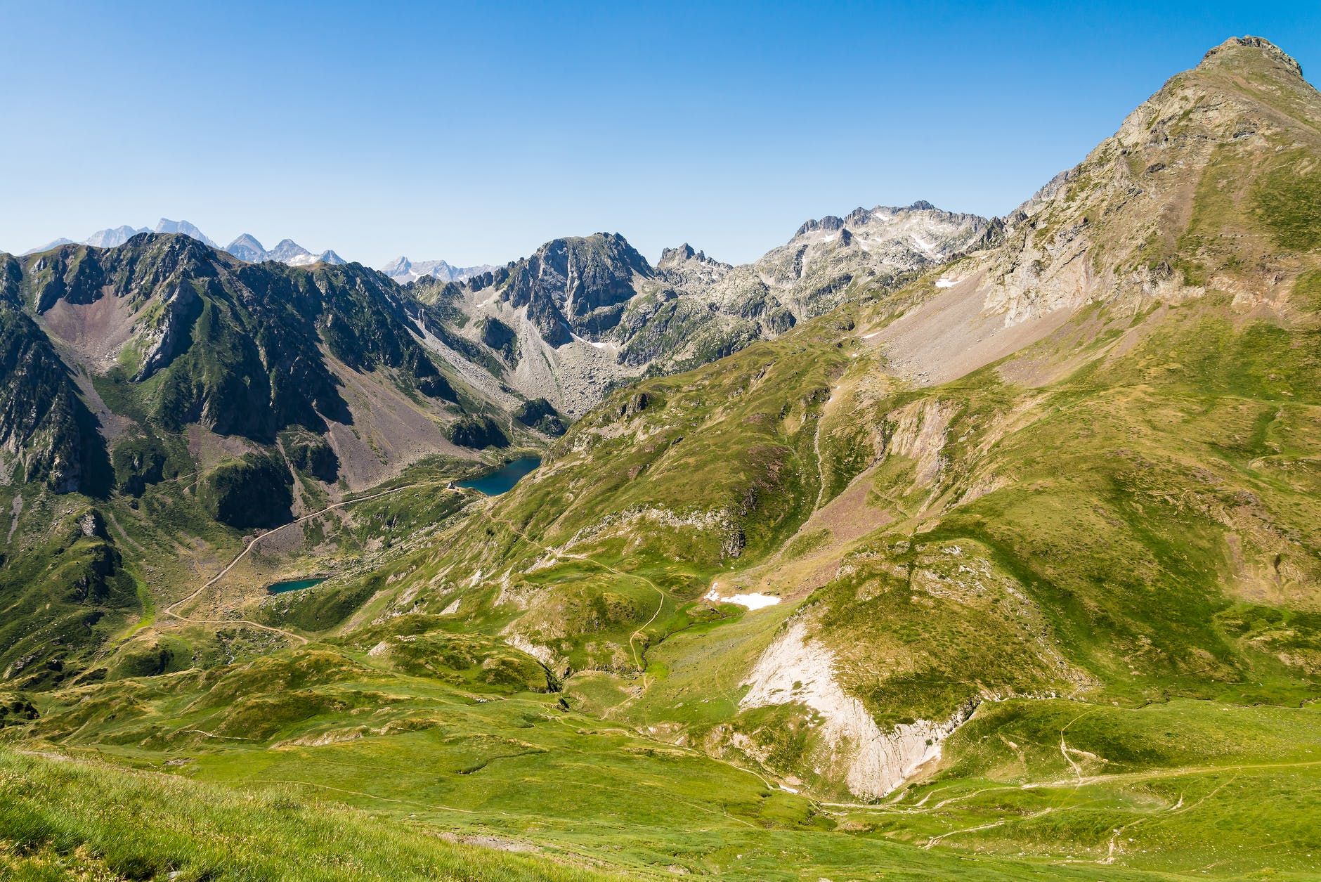 green and brown mountains under blue sky